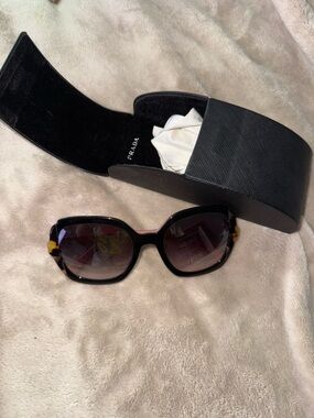 Prada Women's SPR 16U sunglasses in tortoise and pink